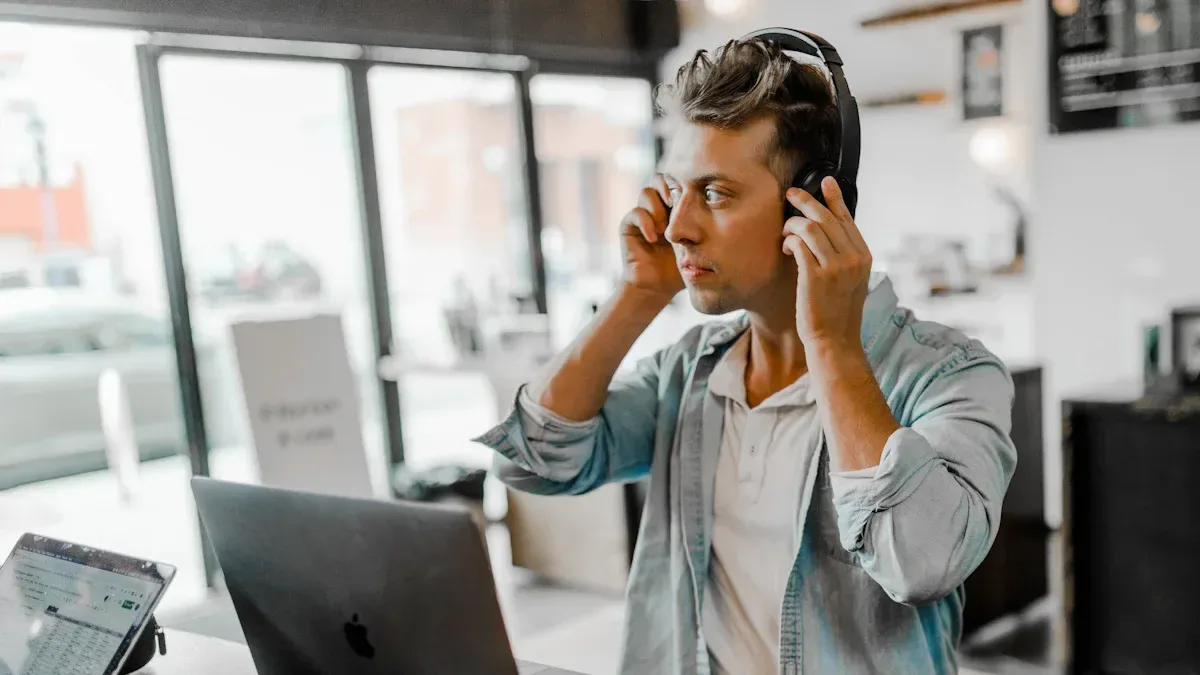Smiling call center contact agent providing professional customer support using modern communication tools in a remote workspace.
