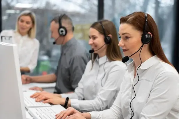 Professional call center company team delivering exceptional customer support services using headsets and desktop systems in a modern office.